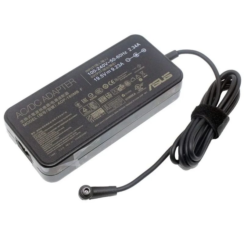 A black ASUS 180W AC/DC adapter with a rating label and a cable held by a Velcro strap