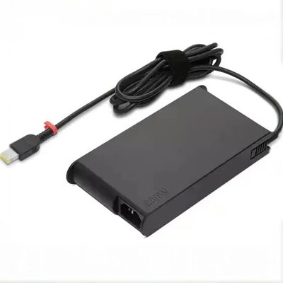 A slim black Lenovo 230W laptop adapter with a rectangular slim-tip connector marked with a red ring