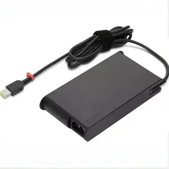 A slim black Lenovo 230W laptop adapter with a rectangular slim-tip connector marked with a red ring